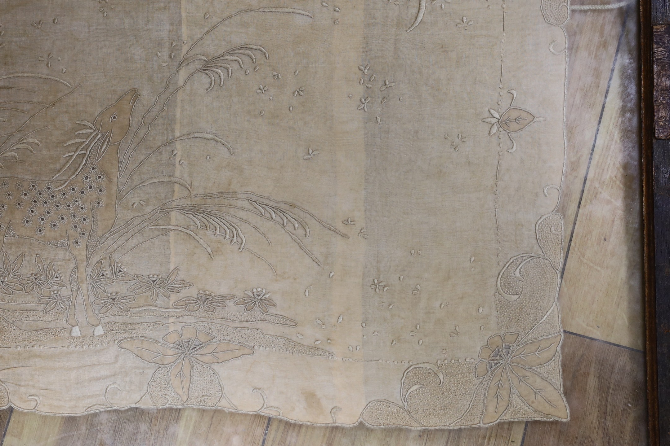 A framed embroidered silk panel, 48 cms wide x 38 cms high